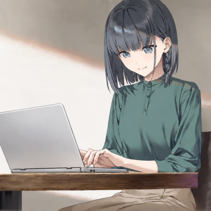 Yuna working on a silver laptop in a cozy café.